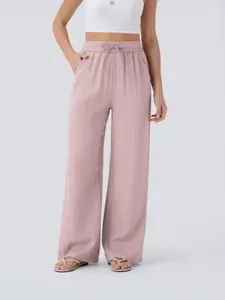 High waist drawstring wide leg casual linen pants with pockets for women beach summer wear.