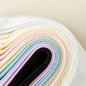 Solid color cotton slouch socks for women, soft mid-tube socks in multiple vibrant colors.