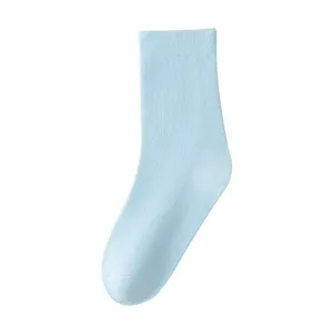 Light blue mid-tube socks for women, solid color casual cotton daily wear fashion hosiery.