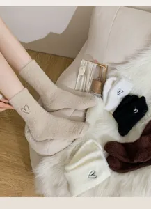 Women thick cozy winter fuzzy mid-tube socks with cute heart embroidery for home daily wear.