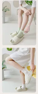Women solid color mid-calf casual socks paired with comfy platform slide sandals detail view
