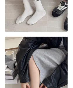 Detailed shot of women cotton mid-tube socks, soft ribbed design, comfortable and breathable.