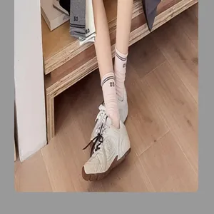 Cute cotton mid-tube socks for women autumn winter preppy style striped daily wear detail view.