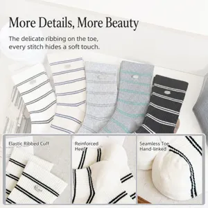 Cute white striped cotton mid-tube socks for women, trendy seamless design for daily wear.