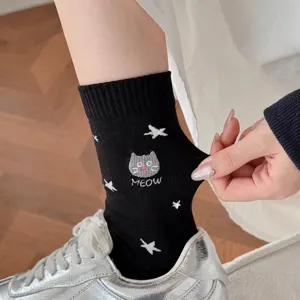 Cute cotton mid-tube socks for women, featuring sweet cat embroidery and breathable soft fabric.