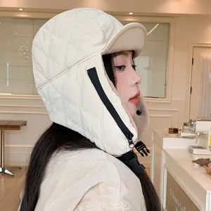 Winter warm quilted bomber hat for women, windproof trapper cap with ear flaps and buckle.