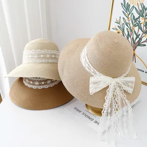 Summer straw hat for women with lace bow, perfect for beach vacation and daily sun protection.