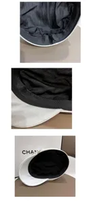 Detail view of the white flat top beret cap with delicate pearl trim and smooth silk sheen lining.