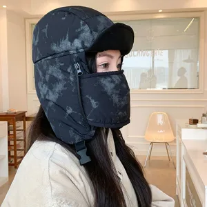 Side detail view of winter windproof trapper hat with fleece lining, face mask and zipper.