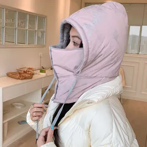 Detailed view of the pink windproof winter thermal trapper hat with integrated face mask.