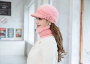 Women winter fleece-lined knitted hat and scarf set, pink fuzzy cap with visor and flower.