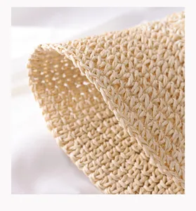 Nahaufnahme der Strohhut Textur, handgefertigt, sommerlicher Strand Sonnenschutz.