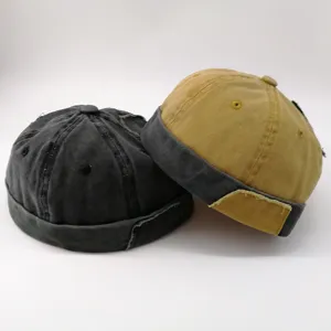 Primer plano detalle del gorro docker sin ala lavado vintage, estilo streetwear retro casual.