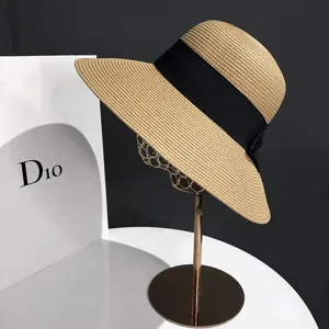 Chapeau de paille à large bord pour femme chapeau de plage d'été avec nœud ruban noir.