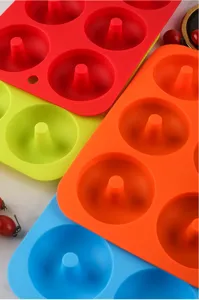 Silicone 6-cavity donut mold for DIY baking, vibrant color kitchen bakeware tool.