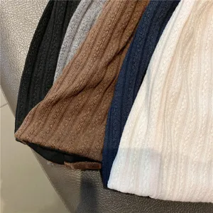 Detailed view of soft ribbed sleep caps showing multiple color options for comfort.