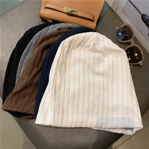 Detailed view of soft knitted ribbed sleep caps in multiple colors, cozy and breathable.
