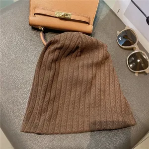 Brown ribbed knit beanie sleeping cap, soft breathable head cover for daily and night wear.