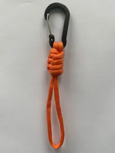 Detailed view of outdoor seven-core paracord keychain with black metal carabiner hook.