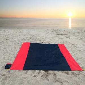 Waterproof outdoor picnic blanket portable folding beach mat with storage bag for camping.