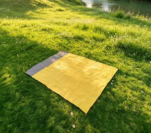 Outdoor waterproof portable picnic mat, foldable camping beach blanket with stakes.