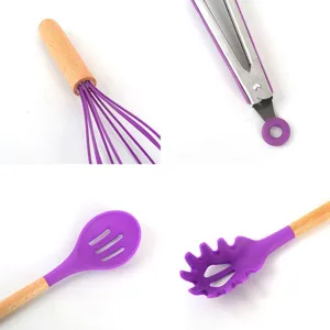 Detail view of purple silicone kitchen utensils with natural wood handles, durable and heat-resistant.