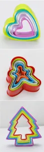 5-piece nested plastic cookie cutters set, heart gingerbread man and tree shapes for baking.