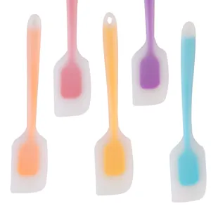 Colorful silicone spatula set, translucent baking scraper for cake mixing and kitchen use.