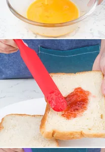 Detailed view of red silicone spatula spreading jam on bread, ideal for baking use.