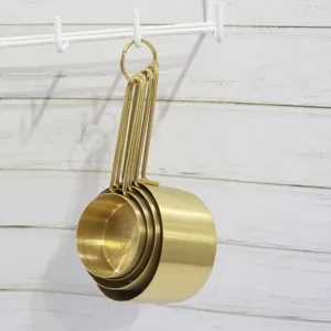 Set di 4 misurini in acciaio inossidabile ramato per cucina e cottura da forno professionale.