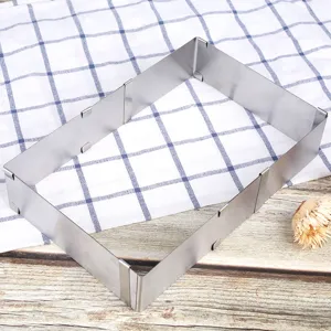 Adjustable stainless steel rectangle mousse cake ring baking mold for home kitchen pastry.