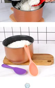 Cucchiaio per riso in silicone e pentola interna antiaderente, dettaglio accessori per cucina.