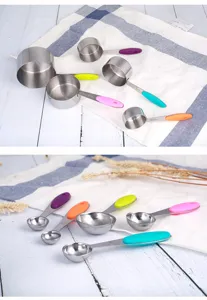 Detail view of stainless steel measuring spoons and cups featuring colorful silicone handles.