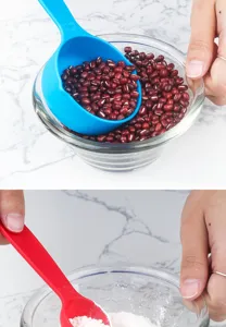 Close-up of baking measuring spoons with clear capacity marks for precise ingredient scaling.