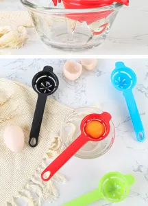 Detail view of creative plastic egg white separator kitchen tool with multi-color options.