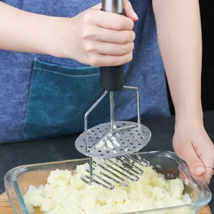 Stainless steel double layer potato masher kitchen tool for easy mashing food preparation.
