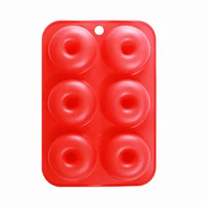 Red 6-cavity silicone donut mold for home baking, flexible cake and pastry DIY tool.