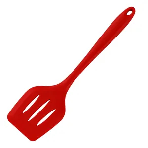 Red silicone slotted spatula for kitchen cooking, non-stick cookware friendly, heat resistant tool.