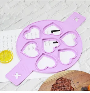 Silicone 7-hole heart shape pancake mold kitchen baking tool detail view display.