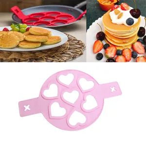 7-hole silicone pancake mold kitchen baking tool for easy DIY egg cooking and cake making.