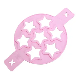 Pink silicone 7-hole star pancake maker, flexible egg ring mold for kitchen baking and breakfast.