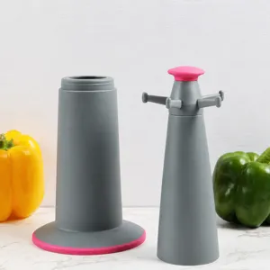 Supporto per utensili da cucina in silicone con base rimovibile e ganci multipli.