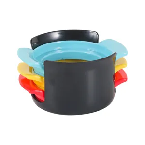 3-in-1 multi-functional egg slicer with colorful inserts and compact storage base for kitchen.