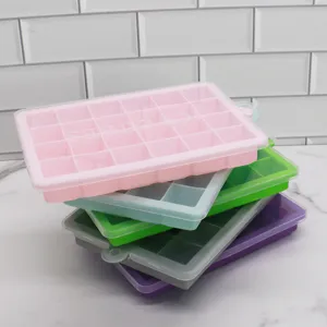 Detailed view of stacked colorful silicone ice cube trays with lids, flexible and durable.