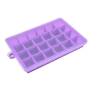 Silicone ice cube tray detail view with clear lid, flexible grid mold for making ice and baby food.