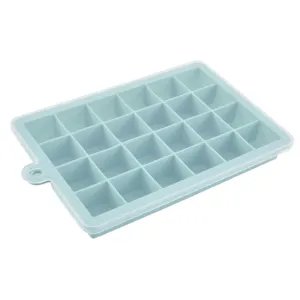 Close-up detail of the silicone ice cube tray with clear lid and hanging hole for kitchen use.