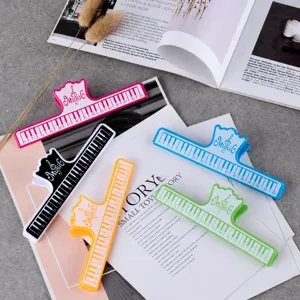 Colorful piano keyboard music clips, creative book page holders for students and music lovers.