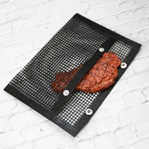 Detailed view of black non-stick mesh grill bag with secure metal snaps for outdoor BBQ.