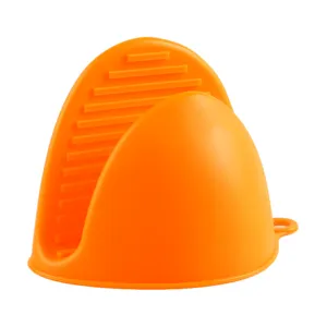 Heat-resistant silicone pinch mitt and oven glove in bright orange for safe baking and cooking.