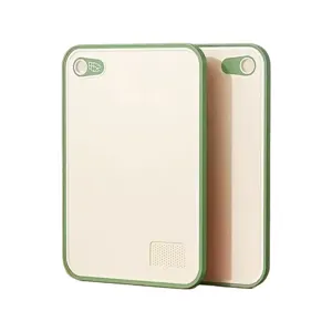 Double-sided antibacterial plastic cutting board with hanging hole and grinding area for kitchen.